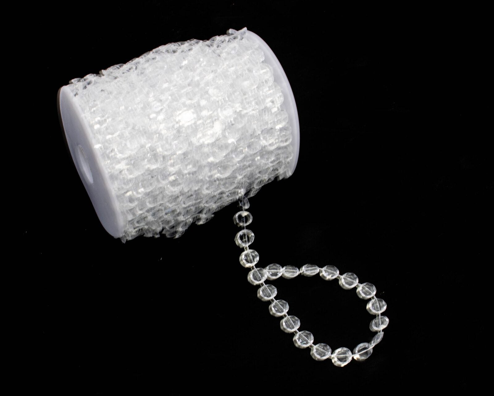 margele-pe-rola-plastic-rotund-transparent-30m