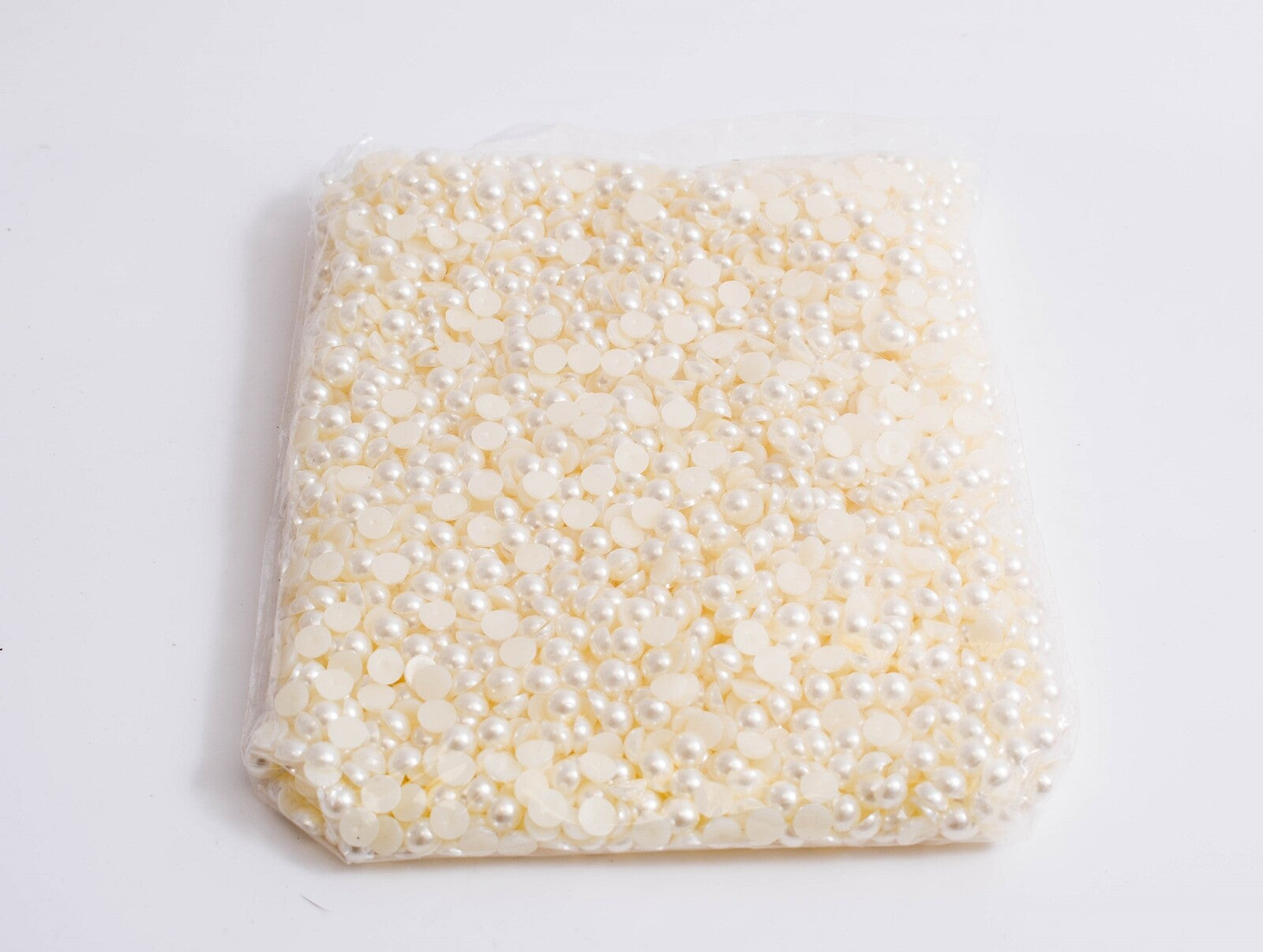 margele-plastic-jumatati-gaurite-perla-08cm500g