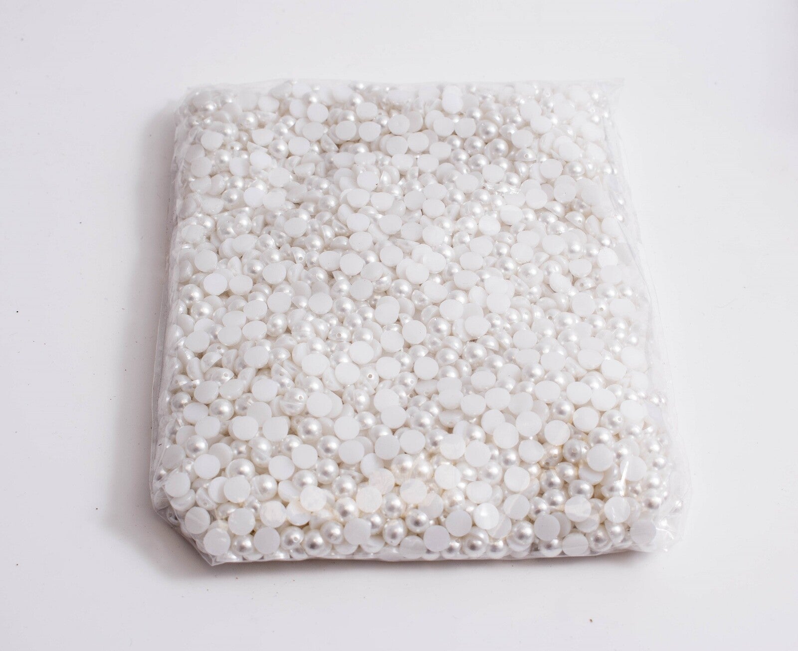 margele-plastic-jumatati-gaurite-perla-06cm500g