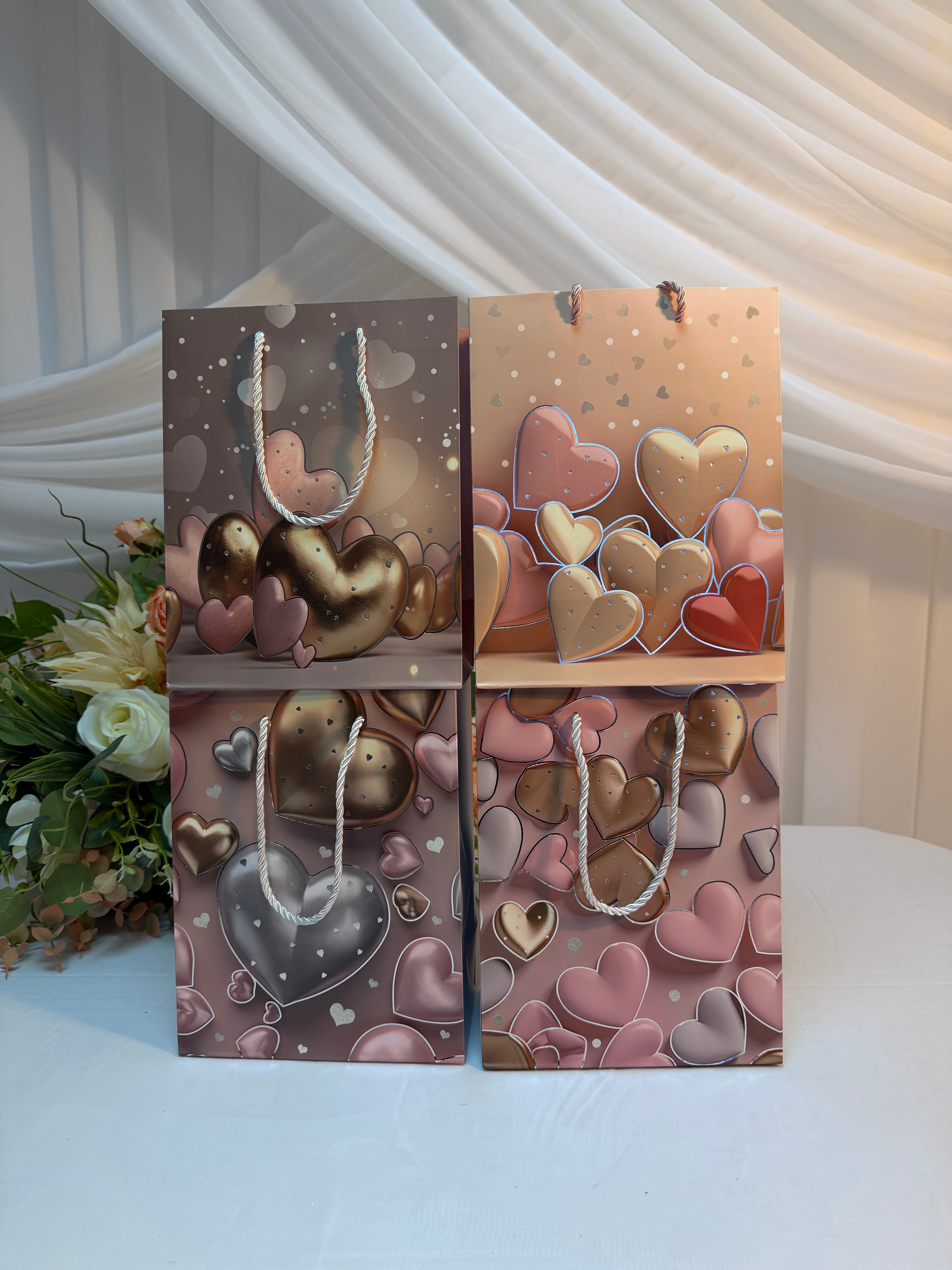 Pungi cadou inimi roz-auriu 12/set